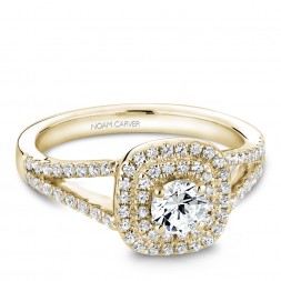 A Carver Studio yellow gold engagement ring with a double halo .