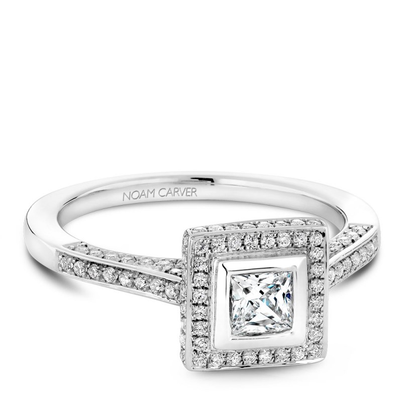 A modern Carver Studio white gold engagement ring with a square halo and 123 diamonds.