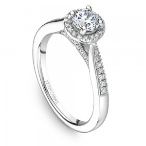 A floral Carver Studio white gold engagement ring with 45 diamonds.