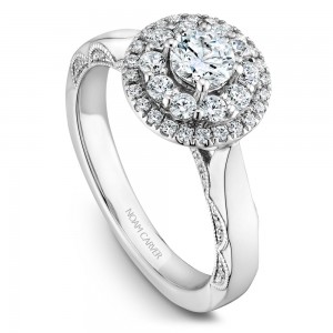 A floral Carver Studio white gold engagement ring with 47 diamonds.