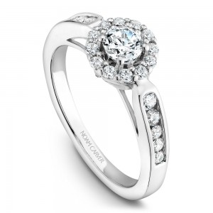 A vintage Carver Studio white gold engagement ring with 25 diamonds.