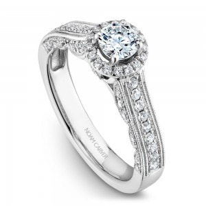 A vintage Carver Studio white gold engagement ring with 61 diamonds.