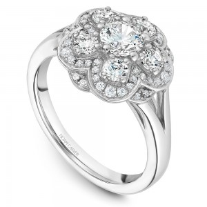 A floral Carver Studio white gold engagement ring with 56 diamonds.