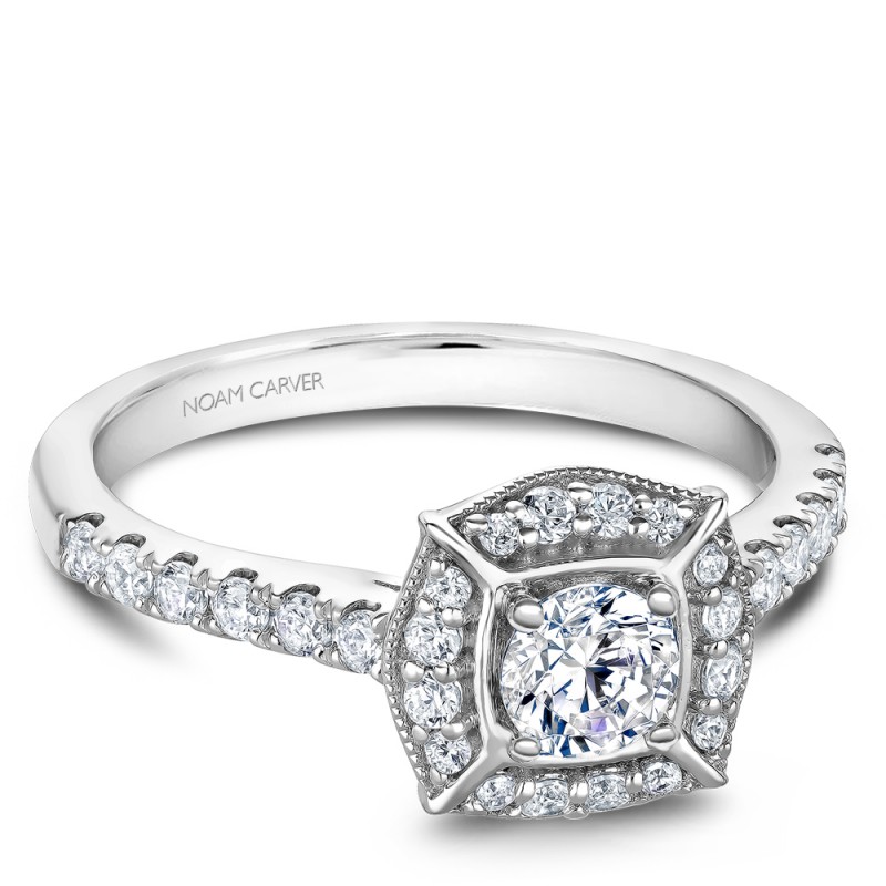A modern Carver Studio white gold engagement ring and 31 diamonds.