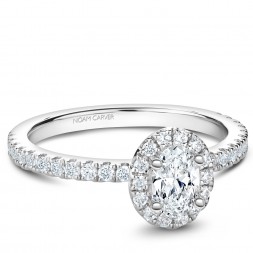 A Carver Studio white gold engagement ring with an oval halo and 37 diamonds.