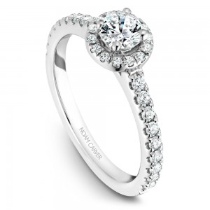 A halo Carver Studio white gold engagement ring with a round center stone.
