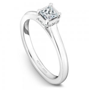 A solitaire Carver Studio white gold engagement ring with a princess diamond and 13 diamonds.