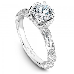 A floral Carver Studio white gold engagement ring with a round center stone and 101 diamonds.