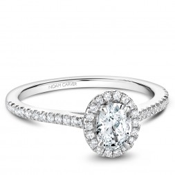 A Carver Studio white gold engagement ring with an oval halo and 41 diamonds.