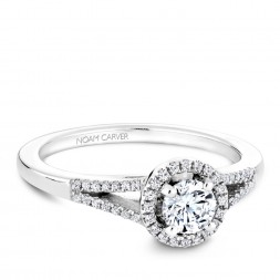 A Carver Studio white gold engagement ring with a split band, a halo and 59 diamonds.