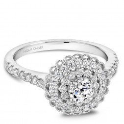 A floral Carver Studio white gold engagement ring with a double halo and 55 diamonds.