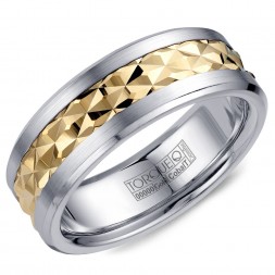 A Torque Ring In White Cobalt With A Carved Patterened Yellow Gold Center.