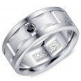 A Torque Ring In White Cobalt With A Carved White Gold Center And A Black Sapphire.