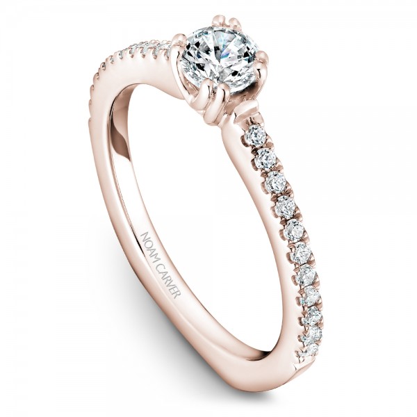 A Carver Studio rose gold engagement ring with 23 diamonds.