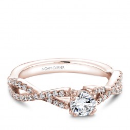 A Carver Studio rose gold engagement ring with a twist band and 53 diamonds.