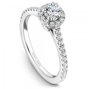 A Carver Studio white gold engagement ring with a halo.