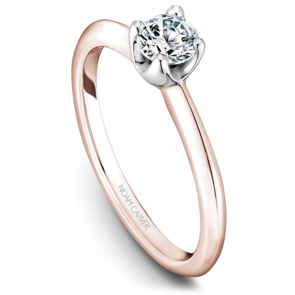 A floral Carver Studio rose and white gold engagement ring with a round center stone.