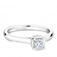 A solitaire Carver Studio white gold engagement ring with a princess diamond and 13 diamonds.