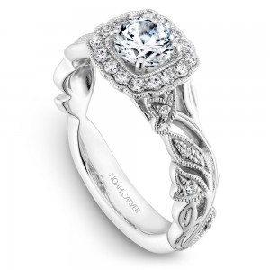 A floral Carver Studio white gold engagement ring with a round center stone and 25 diamonds.