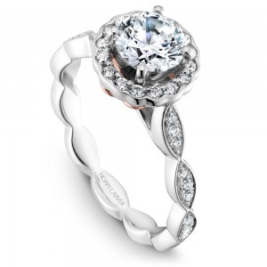 A Carver Studio white gold engagement ring with a floral halo and 35 diamonds.