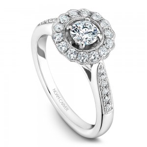 A floral Carver Studio white gold engagement ring with 27 diamonds.