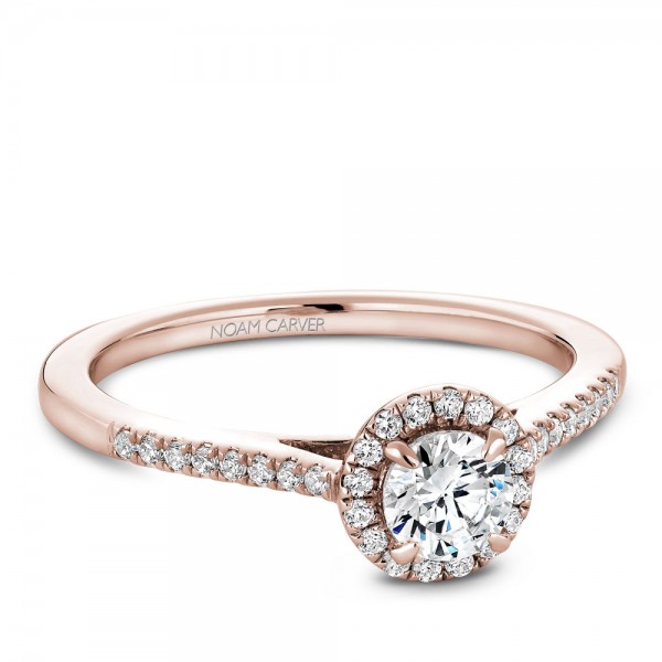 A Carver Studio rose gold engagement ring with 33 diamonds.