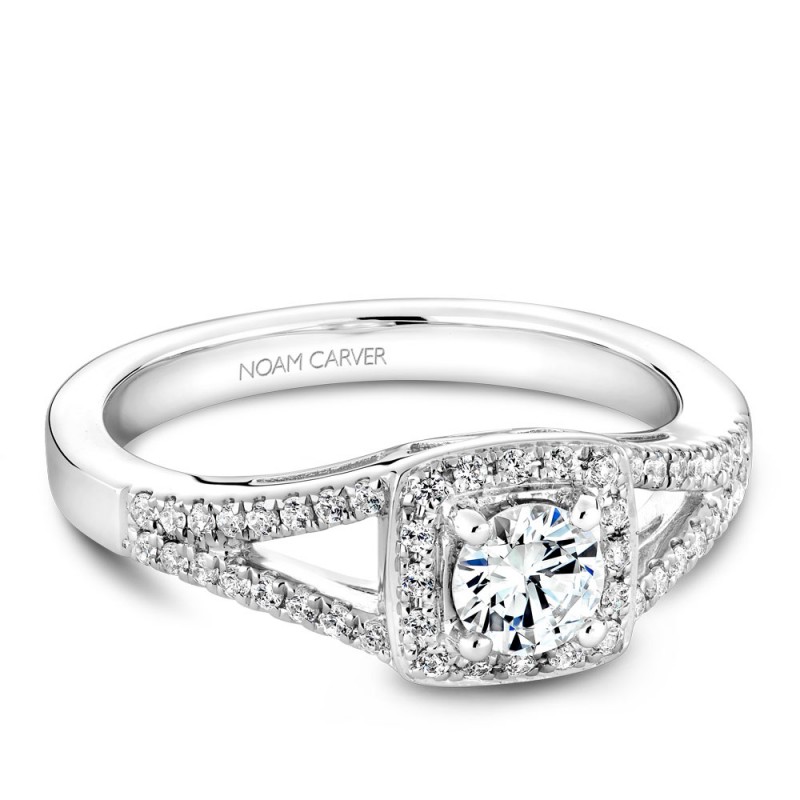 A Carver Studio white gold engagement ring with a split band, a cushion halo and 49 diamonds.