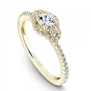 A 3-stone Carver Studio yellow gold engagement ring with 47 diamonds.