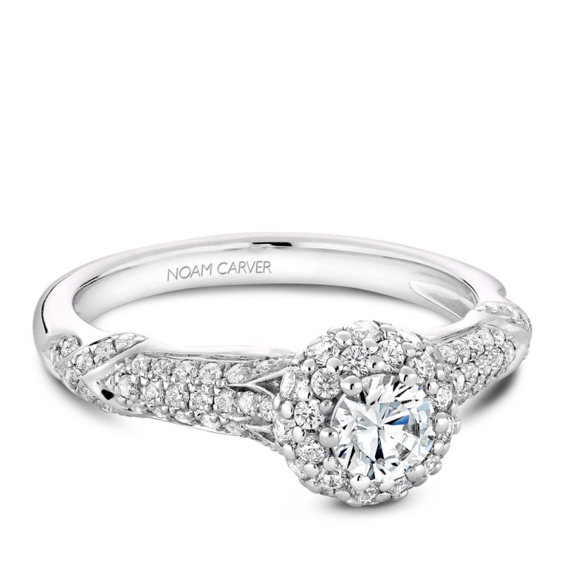 A modern Carver Studio white gold engagement ring with 87 diamonds.