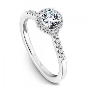 A Carver Studio white gold engagement ring with an oval halo and 44 diamonds.