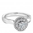 A floral Carver Studio white gold engagement ring with 47 diamonds.