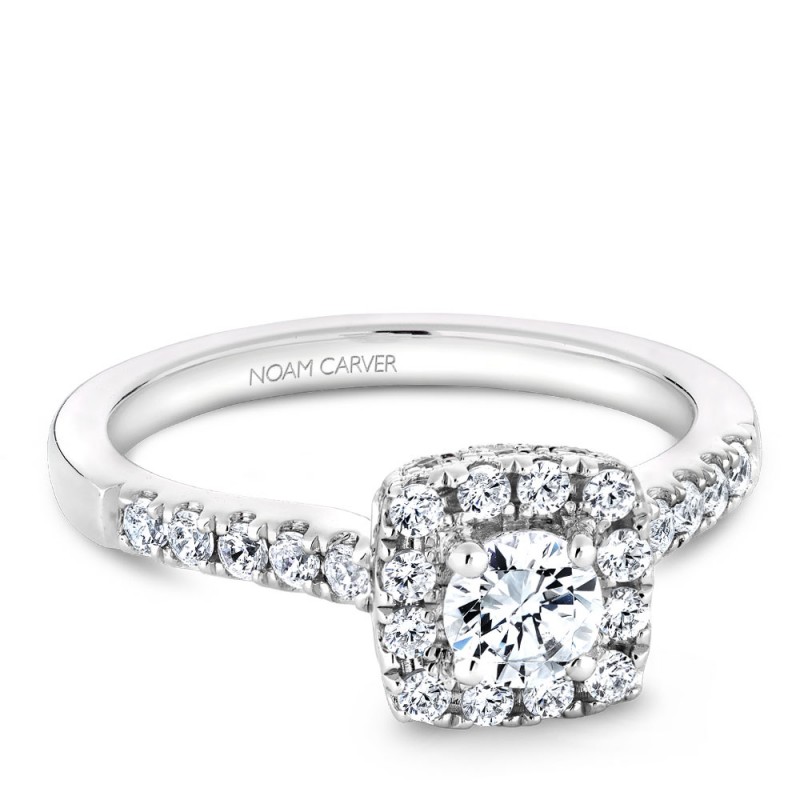 A Carver Studio white gold engagement ring with a square halo and 33 diamonds.