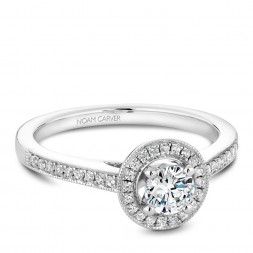 A Carver Studio white gold engagement ring with a halo and 39 diamonds.