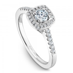 A Carver Studio white gold engagement ring with a cushion halo and 33 diamonds.