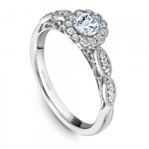 A floral Carver Studio white gold engagement ring with 25 diamonds.