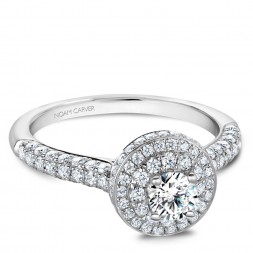 A Carver Studio white gold engagement ring with a double halo and 105 diamonds.