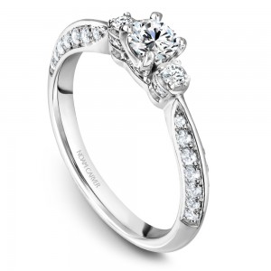 A floral 3-stone Carver Studio white gold engagement ring with 39 diamonds.