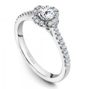 A floral Carver Studio white gold engagement ring with 31 diamonds.