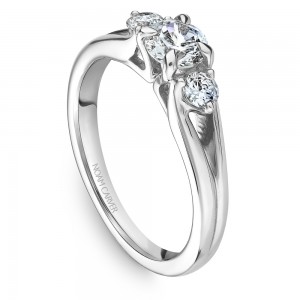 A 3-stone Carver Studio white gold engagement ring.
