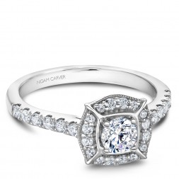 A modern Carver Studio white gold engagement ring and 31 diamonds.