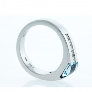 Blue Topaz and Diamond Ring (.50ctw)